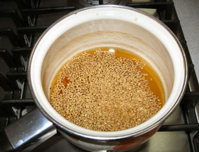 Flax seeds and water in pan